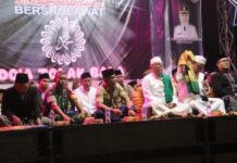 PEMCAM ANJATAN MALAM PERGANTIAN TAHUN DENGAN DOA BERSAMA PEMBERIAN SANTUNAN