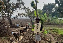 Pemdes Jatimulya Dengan Warga Gotong Royong Bersihkan Saluran Irigasi Tani